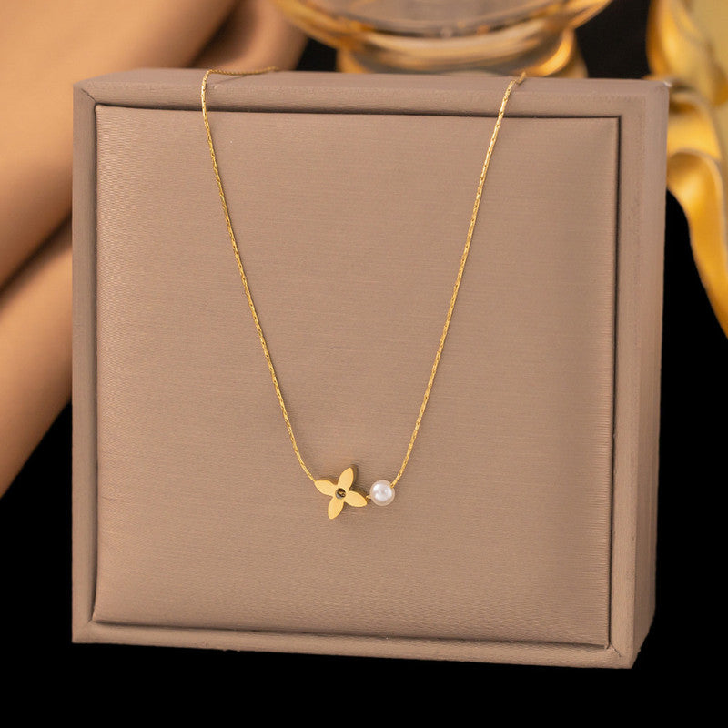 Minimal Gold Flower Necklace with Pearl Detail