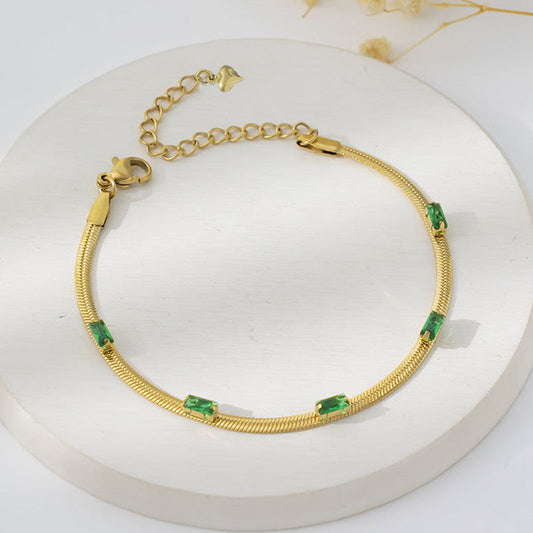 Gold-Plated Snake Chain Bracelet with Green Crystal Accents