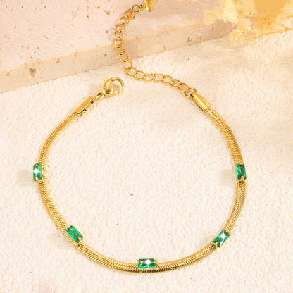 Gold-Plated Snake Chain Bracelet with Green Crystal Accents