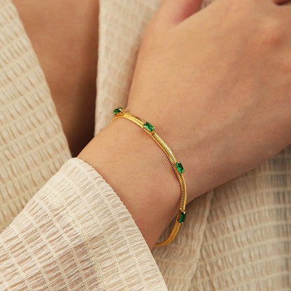 Gold-Plated Snake Chain Bracelet with Green Crystal Accents