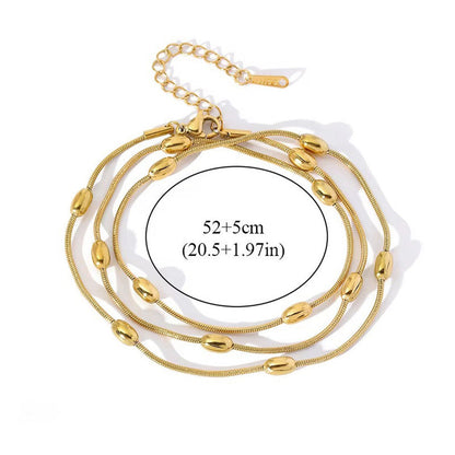Gold-Plated Multi-Layer Snake Chain Bracelet with Oval Beads