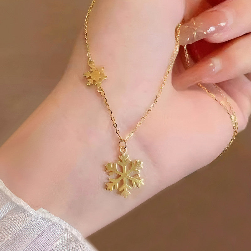 Gold-Plated Snowflake Pendant Necklace with Mini Charm Detail
