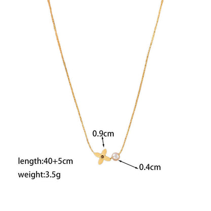 Minimal Gold Flower Necklace with Pearl Detail