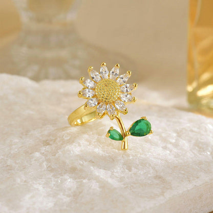 Gold-Plated Crystal Flower Ring with Green Stone Accent