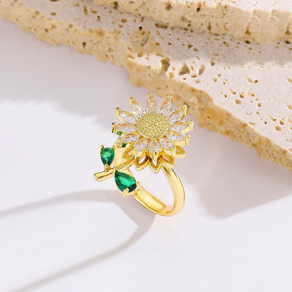 Gold-Plated Crystal Flower Ring with Green Stone Accent