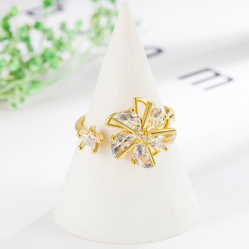 Gold-Plated Crystal Flower Ring with Star Accent