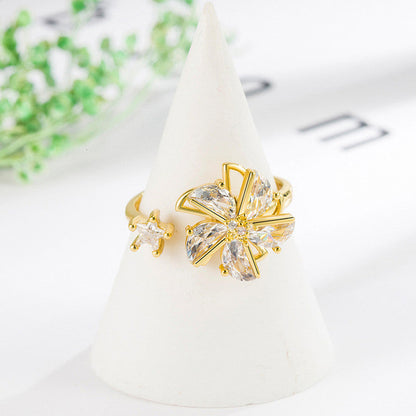 Gold-Plated Crystal Flower Ring with Star Accent