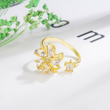 Gold-Plated Crystal Flower Ring with Star Accent