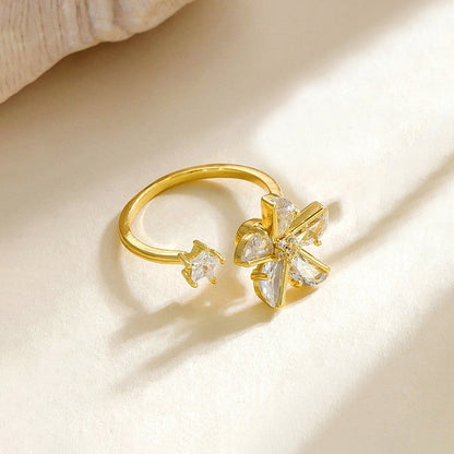 Gold-Plated Crystal Flower Ring with Star Accent